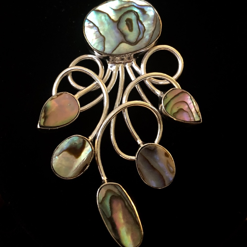 Pendant. 2 1/2” high, 1 1/2” wide